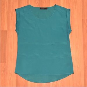 The limited lightweight flowy blouse high-low hem